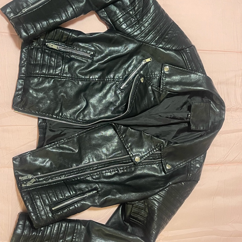 Sleek Black Leather Biker Jacket with Quilted Sleeves
